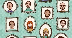 faces in frames on a wall